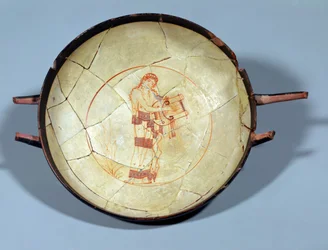 Cup without foot, standing Muse playing the lyre, attributed to the Hesiod painter, white ground Attic period, c.470-460 BC